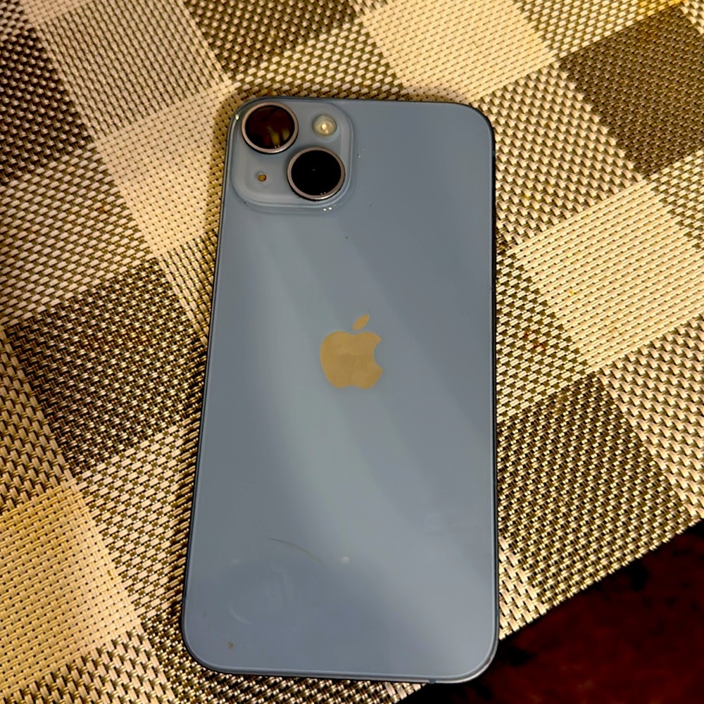 I phone 14.   Great condition.blue. No scratches